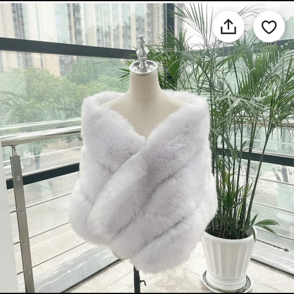 Faux fur light gray fluffy shawl.